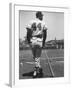 Milwaukee Braves Hank Aaron Leaning on Bat During Baseball Game-George Silk-Framed Premium Photographic Print