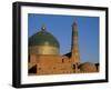 Minaret and Tiled Dome of a Mosque Rise Above the Old City of Khiva-Antonia Tozer-Framed Photographic Print