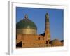 Minaret and Tiled Dome of a Mosque Rise Above the Old City of Khiva-Antonia Tozer-Framed Photographic Print