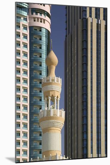 Minaret below Skyscrapers in Dubai-Jon Hicks-Mounted Photographic Print