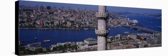 Minaret with Bridge Across the Bosphorus in the Background, Istanbul, Turkey-null-Stretched Canvas