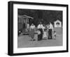 Miner Maurice Ruddick with Family and Friends Walking Near Segregated Camp Site-Carl Mydans-Framed Photographic Print