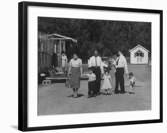 Miner Maurice Ruddick with Family and Friends Walking Near Segregated Camp Site-Carl Mydans-Framed Photographic Print