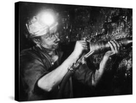 Miner Using an Hydraulic Drill at the Coal-Face, at Cape Bank Hall Pit, Burnley, in Lancashire-Henry Grant-Stretched Canvas