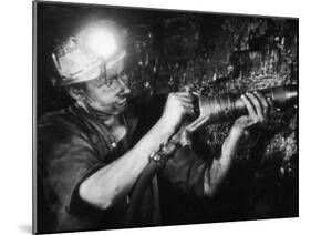 Miner Using an Hydraulic Drill at the Coal-Face, at Cape Bank Hall Pit, Burnley, in Lancashire-Henry Grant-Mounted Photographic Print