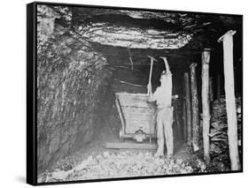 Miner Working in a Coal Mine Photograph-Lantern Press-Framed Stretched Canvas