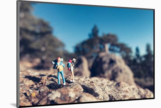 Miniature Hikers with Backpacks-Kirill_M-Mounted Photographic Print