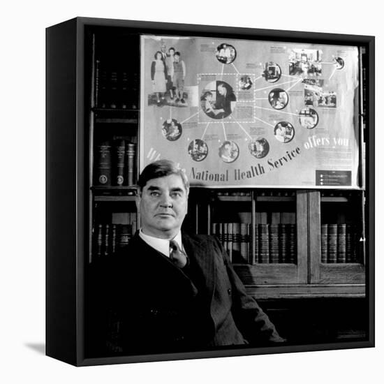 Minister of Health Aneurin Bevan, Sitting Beneath "National Health Service" Poster-null-Framed Stretched Canvas