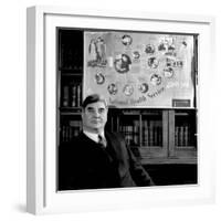 Minister of Health Aneurin Bevan, Sitting Beneath "National Health Service" Poster-null-Framed Photographic Print