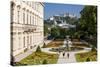 Mirabell Palace and Mirabell Gardens against Salzburg Cathedral and Fortress Hohensalzburg-null-Stretched Canvas