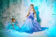 Little Girl with Mother in Princess Dress on a Background of a Winter Fairy Tale. Baby and Mom Snow-Miramiska-Photographic Print