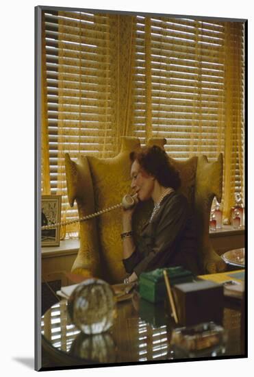 Miss Evyan "Baroness Langer Von Langendorff" Sitting at Her Desk, New York, NY, 1956-Leonard Mccombe-Mounted Photographic Print