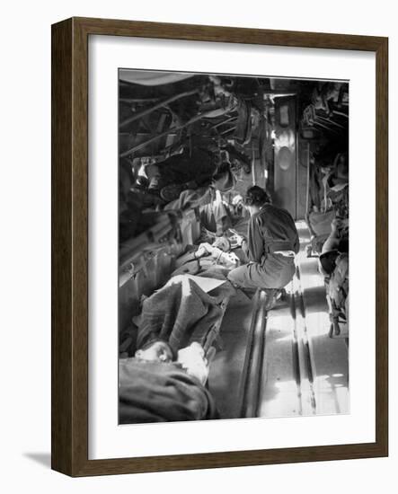Miss Mary Smith of South Carolina Treating Patients During Flight to North-American Photographer-Framed Photographic Print