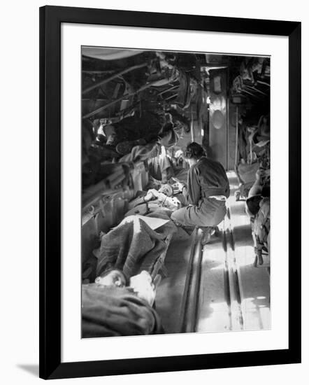 Miss Mary Smith of South Carolina Treating Patients During Flight to North-American Photographer-Framed Photographic Print