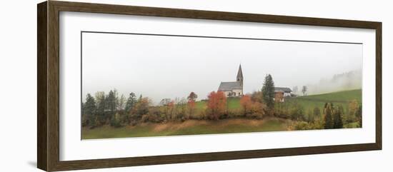 Mist and colourful trees surround the alpine church in the fall, St. Magdalena, Funes Valley, South-Roberto Moiola-Framed Photographic Print