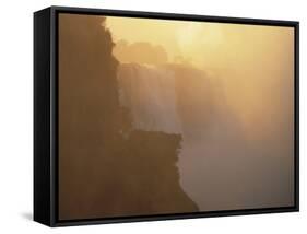 Mist Over Victoria Falls at Sunrise, Zimbabwe-Jim Zuckerman-Framed Stretched Canvas