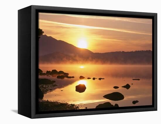 Mist Rising on Derwent Water at Sunrise, Lake District National Park, Cumbria, England, UK-Nigel Blythe-Framed Stretched Canvas