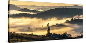 Misty farmland and mountains, Romania-Art Wolfe Wolfe-Stretched Canvas
