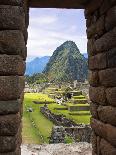 View Through Window of Ancient Lost City of Inca, Machu Picchu, Peru, South America with Llamas-Miva Stock-Photographic Print