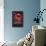 MLB Cincinnati Reds - Neon Helmet 23-Trends International-Framed Stretched Canvas displayed on a wall