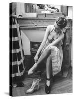 Model Changing Her Shoes For Pierre Balmain's Fashion Show-Nina Leen-Stretched Canvas