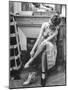 Model Changing Her Shoes For Pierre Balmain's Fashion Show-Nina Leen-Mounted Photographic Print