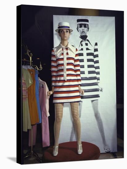 Model Dari Lallou Standing in Front of Poster of Twiggy Wearing Look a Like Outfit-Ralph Crane-Stretched Canvas