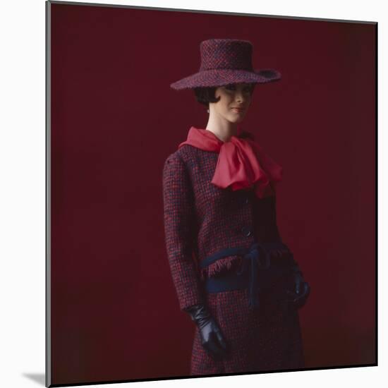 Model Dressed in a Matching Tweed Hat, Jacket, and Skirt by Yves St Laurent, Paris, France, 1962-Paul Schutzer-Mounted Photographic Print