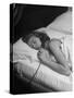 Model Gaby Bouche Talking on the Phone from Her Hotel Room-Nina Leen-Stretched Canvas