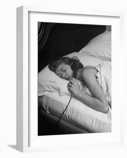 Model Gaby Bouche Talking on the Phone from Her Hotel Room-Nina Leen-Framed Photographic Print