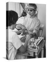 Model Getting a Manicure Prior to the "April in Paris" Charity Ball-Yale Joel-Stretched Canvas