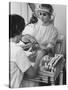 Model Getting a Manicure Prior to the "April in Paris" Charity Ball-Yale Joel-Stretched Canvas