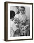 Model Getting a Manicure Prior to the "April in Paris" Charity Ball-Yale Joel-Framed Photographic Print