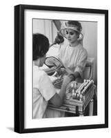 Model Getting a Manicure Prior to the "April in Paris" Charity Ball-Yale Joel-Framed Photographic Print