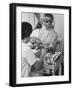 Model Getting a Manicure Prior to the "April in Paris" Charity Ball-Yale Joel-Framed Photographic Print