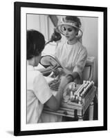 Model Getting a Manicure Prior to the "April in Paris" Charity Ball-Yale Joel-Framed Photographic Print