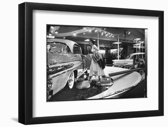 Model Gingerly Traversing Stepping Stones to Get to La Parisienne Pontiac Hard Top Car on Display-Walter Sanders-Framed Photographic Print