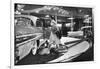 Model Gingerly Traversing Stepping Stones to Get to La Parisienne Pontiac Hard Top Car on Display-Walter Sanders-Framed Photographic Print