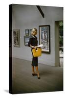 Model in a David Goodstein-Designed Outfit, Looks at Paintings in a Museum, New York, 1954-Nina Leen-Stretched Canvas