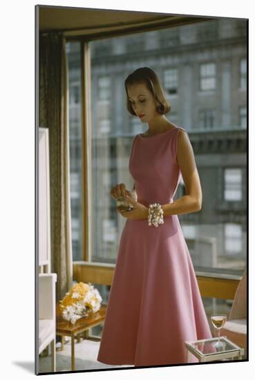 Model in a Pink, Trigere-Designed Cocktail Dress, New York, New York, 1954-Nina Leen-Mounted Photographic Print