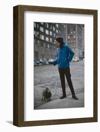 Model in a Tom Brigance-Designed Outfit, Walks a Poodle on a City Street, New York, NY, 1954-Nina Leen-Framed Photographic Print