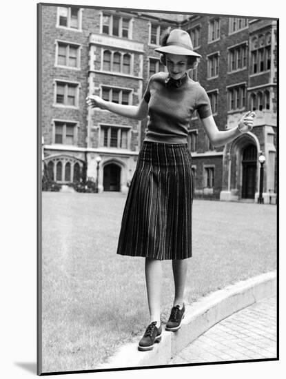 Model in Hat, Sweater and Skirt, Appearing to Balance on Curb, c.1938-Alfred Eisenstaedt-Mounted Photographic Print