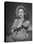 Model Michele Fallon Wearing John Frederics Striped Straw Hat with Matching Handbag-Nina Leen-Stretched Canvas