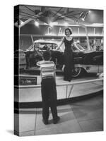 Model Posing Beside Cadillac Eldorado Captures Attention of Young Boy at National Automobile Show-Walter Sanders-Stretched Canvas
