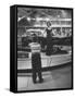 Model Posing Beside Cadillac Eldorado Captures Attention of Young Boy at National Automobile Show-Walter Sanders-Framed Stretched Canvas