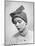 Model Posing in a Bonnet Styled Hat with Streamers That Are Drawn Around the Back of the Head-Nina Leen-Mounted Photographic Print