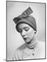 Model Posing in a Bonnet Styled Hat with Streamers That Are Drawn Around the Back of the Head-Nina Leen-Mounted Photographic Print