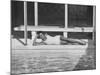 Model Posing Near a Pool-Allan Grant-Mounted Photographic Print