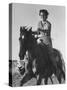 Model Riding a Horse-Allan Grant-Stretched Canvas
