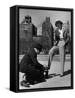 Model Showing Off Slacks as She Reads a First Aid Text Book in Washington Square Park-Nina Leen-Framed Stretched Canvas